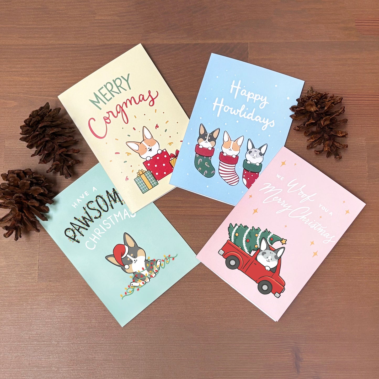 Pack of 4 designs Christmas cards with corgi dogs