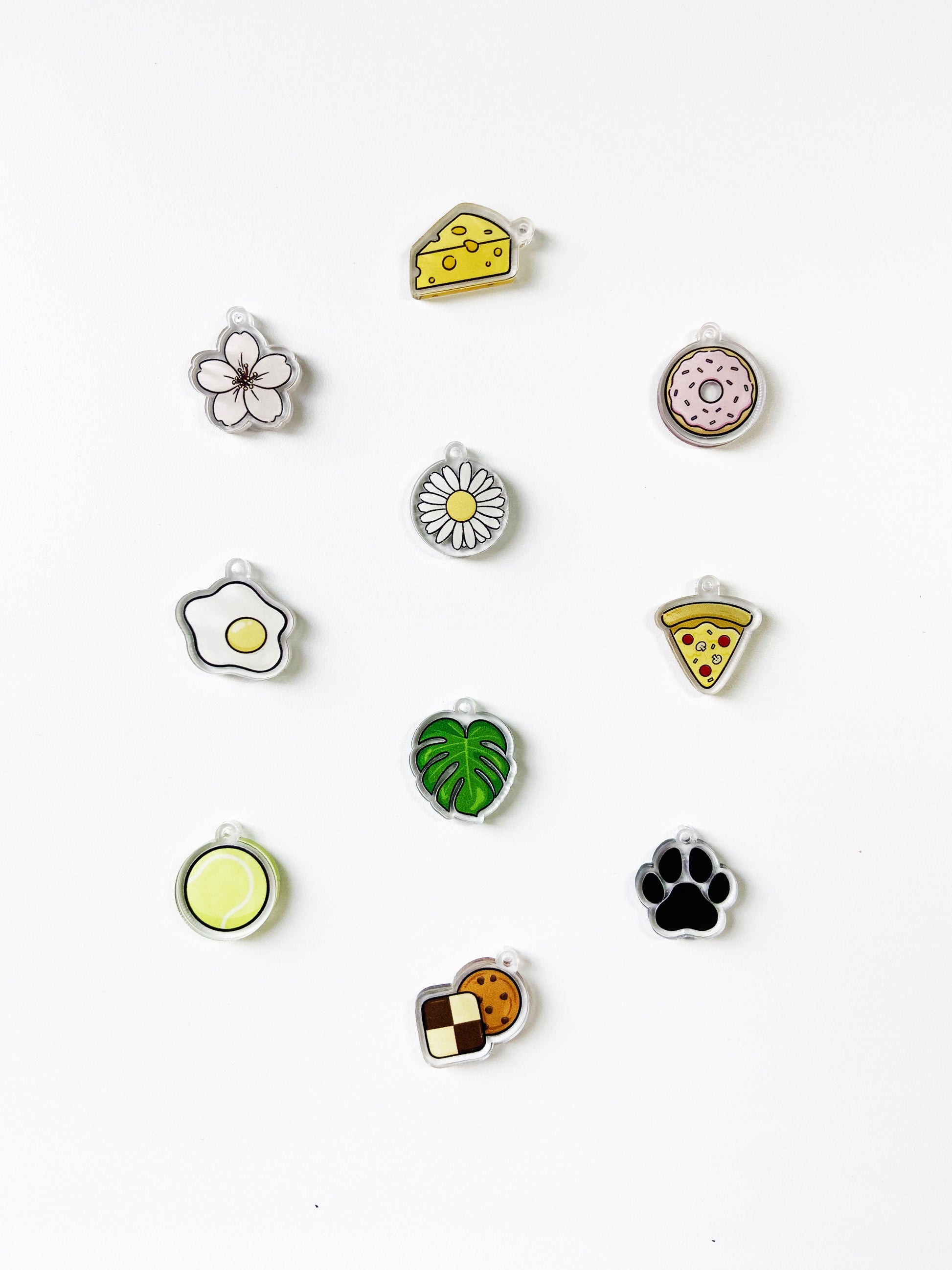 various acrylic charms